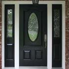 We replaced this plain wihte farm door with an elegant energy effecient entry door system with triple pane glass.